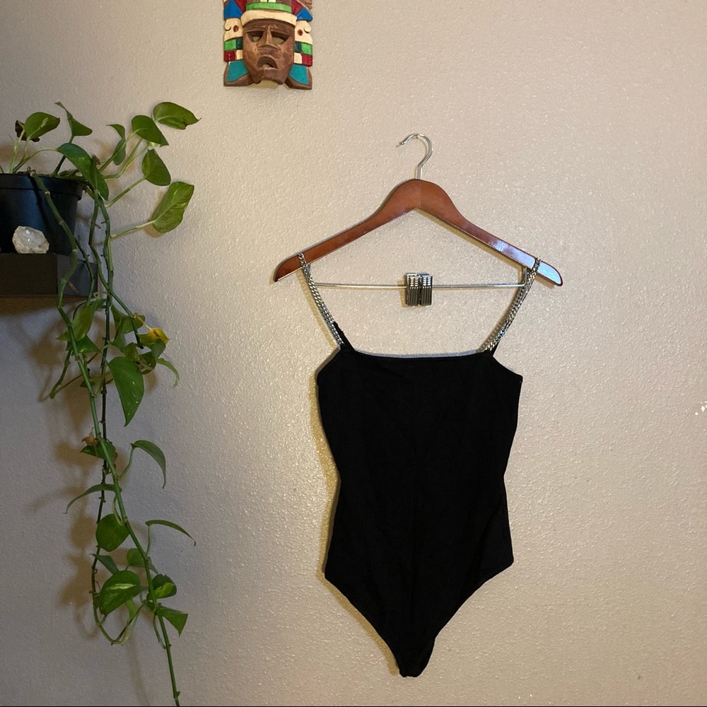 Body suit with chain straps